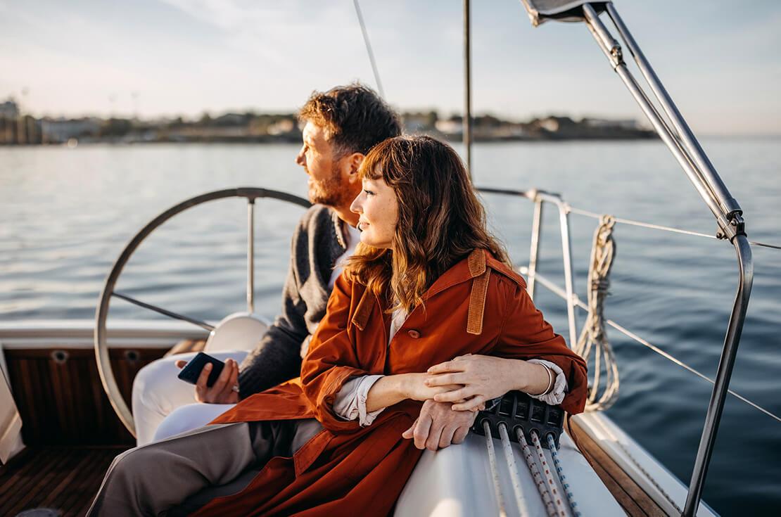 Couple enjoying their vacation on the yacht together